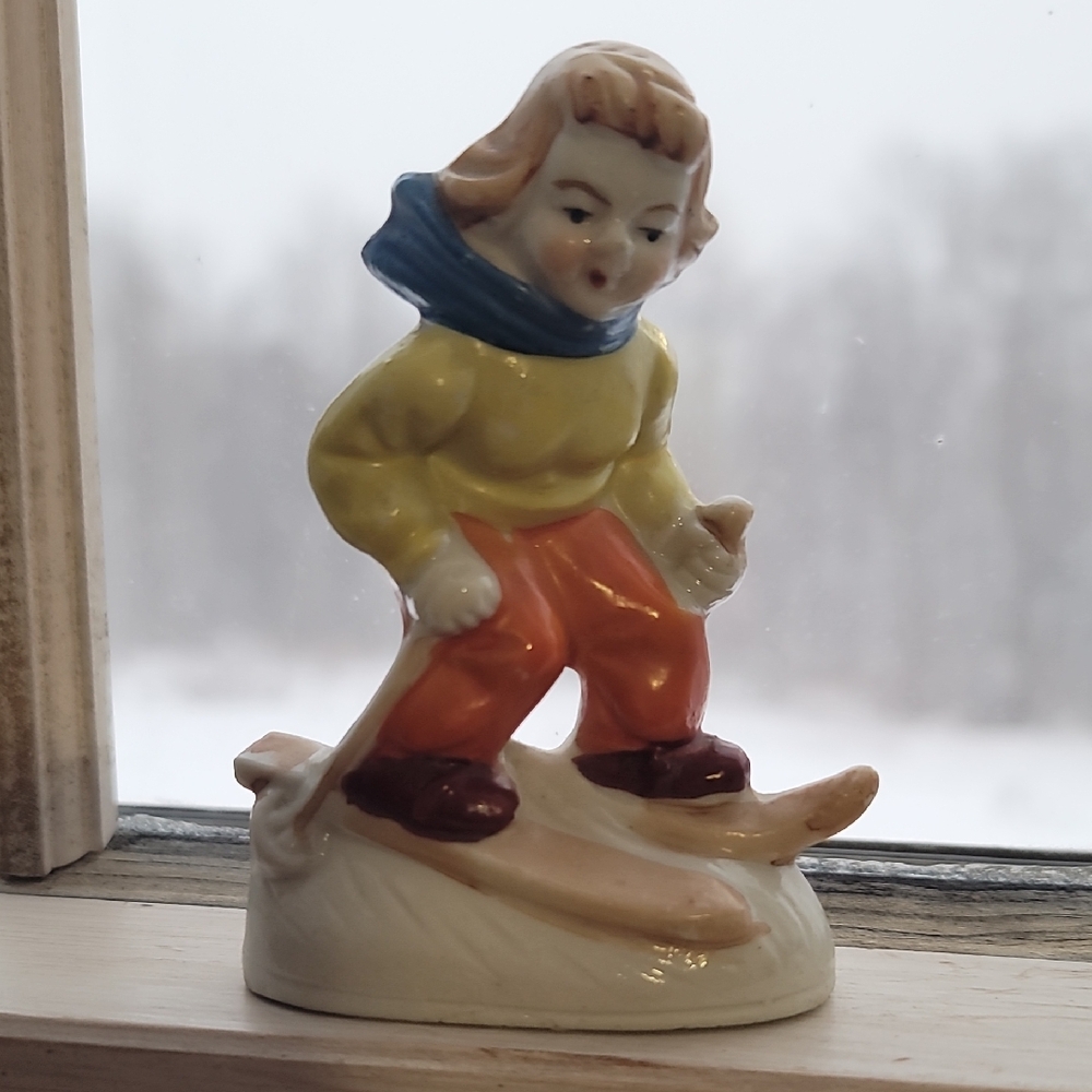 Vintage Skier Figurine with Orange Pants